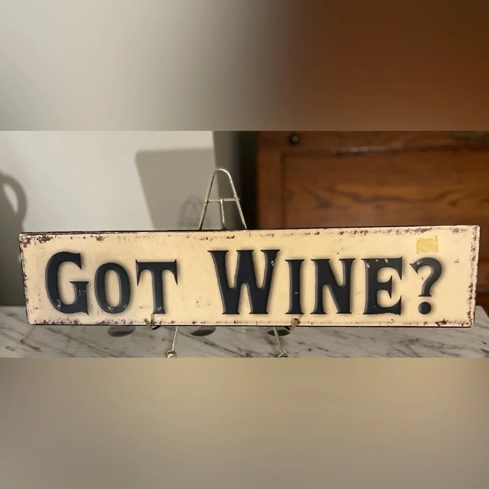 A wall plaque for wine lovers